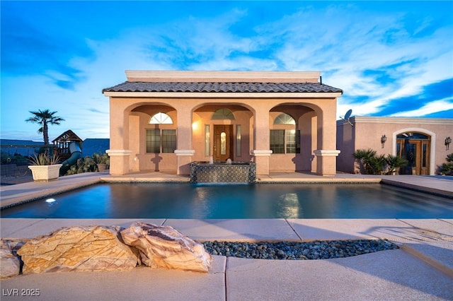 pool featuring a patio