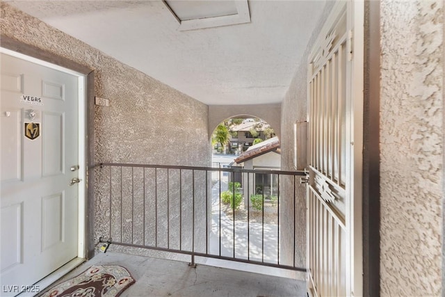 view of exterior entry featuring stucco siding
