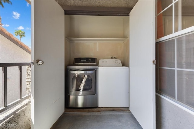 laundry area featuring laundry area and independent washer and dryer