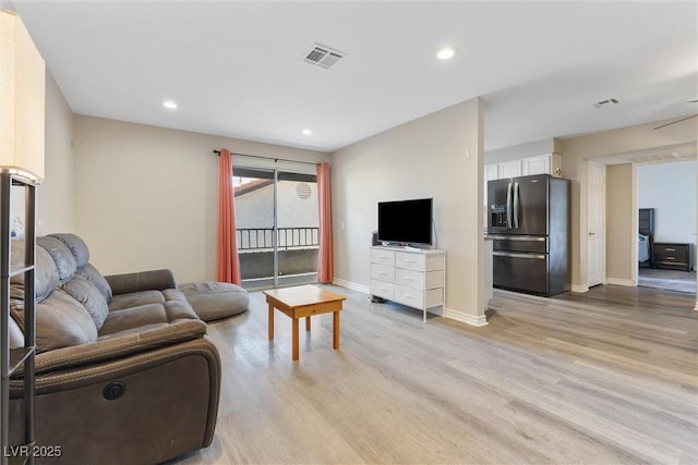 2606 S Durango Dr Unit 260, Las Vegas, NV 89117 - living room with light wood-type flooring, baseboards, and recessed lighting
