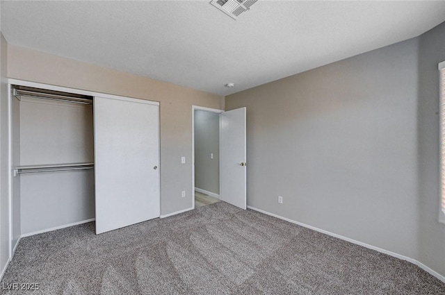 8028 Hurricane Cove Ct, Las Vegas, NV 89129 - unfurnished bedroom featuring baseboards, visible vents, carpet, and a closet