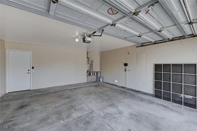 8028 Hurricane Cove Ct, Las Vegas, NV 89129 - garage featuring a garage door opener