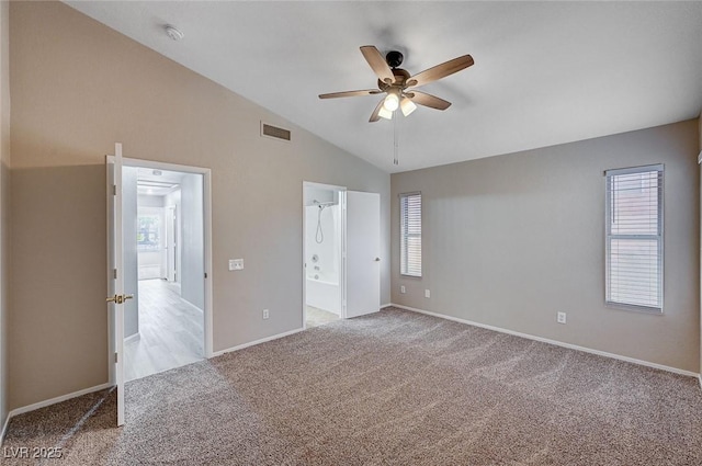 8028 Hurricane Cove Ct, Las Vegas, NV 89129 - unfurnished bedroom featuring vaulted ceiling, visible vents, carpet floors, baseboards, and ensuite bathroom