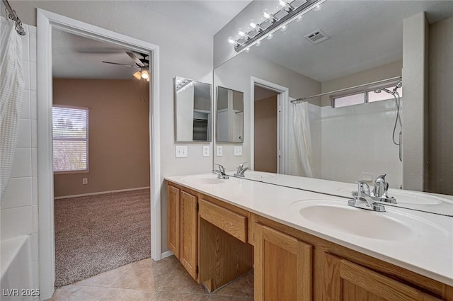 8028 Hurricane Cove Ct, Las Vegas, NV 89129 - full bathroom featuring a wealth of natural light, visible vents, a sink, and ceiling fan