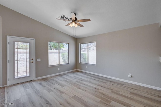 8028 Hurricane Cove Ct, Las Vegas, NV 89129 - spare room with a ceiling fan, lofted ceiling, a healthy amount of sunlight, and light wood-type flooring
