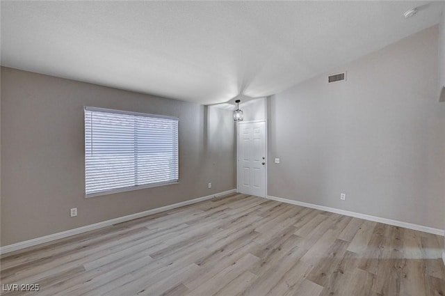 8028 Hurricane Cove Ct, Las Vegas, NV 89129 - empty room with light wood-type flooring, baseboards, and visible vents