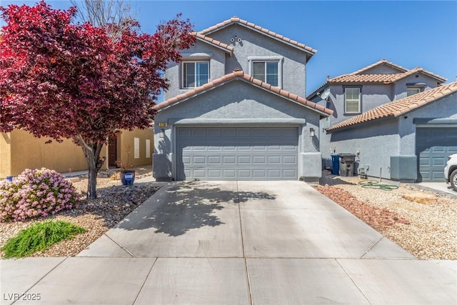 traditional home featuring an attached garage, a tiled roof, driveway, and stucco siding