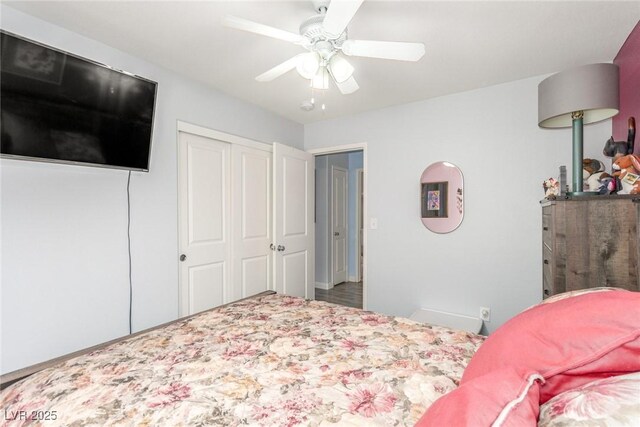 bedroom featuring a ceiling fan and a closet