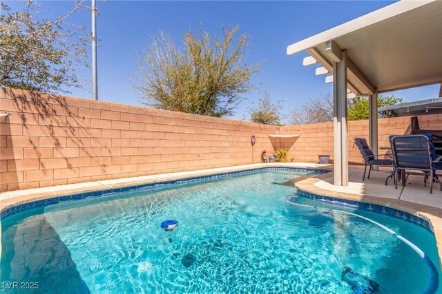 view of pool with a fenced backyard, a fenced in pool, and a patio