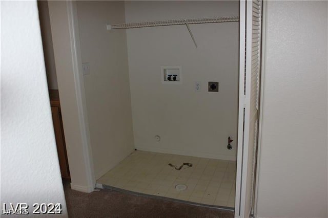 clothes washing area with baseboards, carpet, laundry area, and hookup for an electric dryer