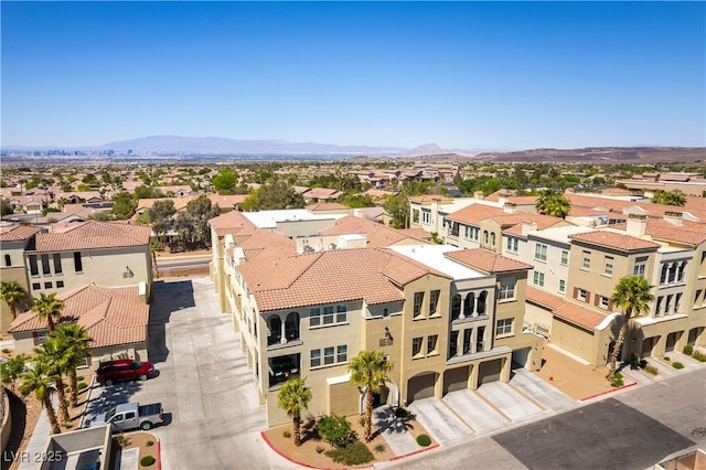 bird's eye view featuring a mountain view and a residential view