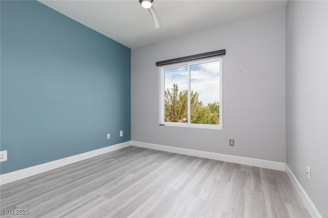 689 Principle Point Ave, Henderson, NV 89012 - unfurnished room featuring wood finished floors, baseboards, and a ceiling fan