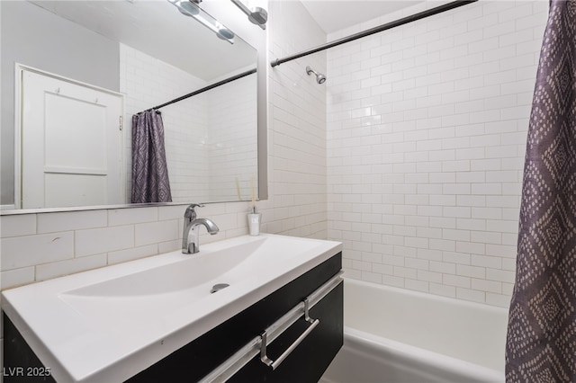 650 Arizona St, Boulder City, NV 89005 - bathroom featuring tasteful backsplash, vanity, and shower / tub combo with curtain