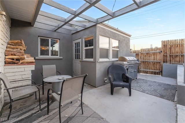 650 Arizona St, Boulder City, NV 89005 - view of patio with fence, a pergola, outdoor dining area, and area for grilling