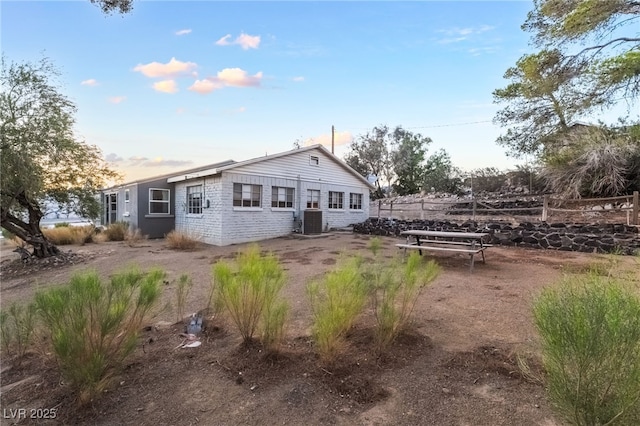 650 Arizona St, Boulder City, NV 89005 - back of house featuring fence and central air condition unit