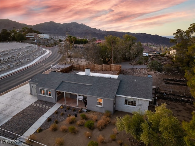 650 Arizona St, Boulder City, NV 89005 - aerial view at dusk featuring a mountain view