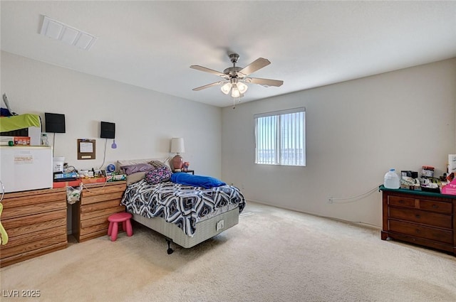 8783 Halcon Ave, Las Vegas, NV 89148 - bedroom with light carpet, a ceiling fan, and visible vents