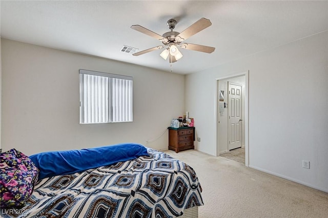 8783 Halcon Ave, Las Vegas, NV 89148 - bedroom featuring baseboards, visible vents, light colored carpet, and ceiling fan