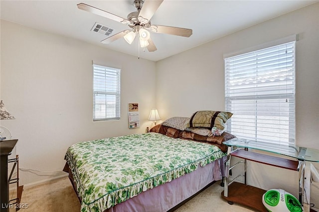 8783 Halcon Ave, Las Vegas, NV 89148 - bedroom with carpet floors, a ceiling fan, and visible vents