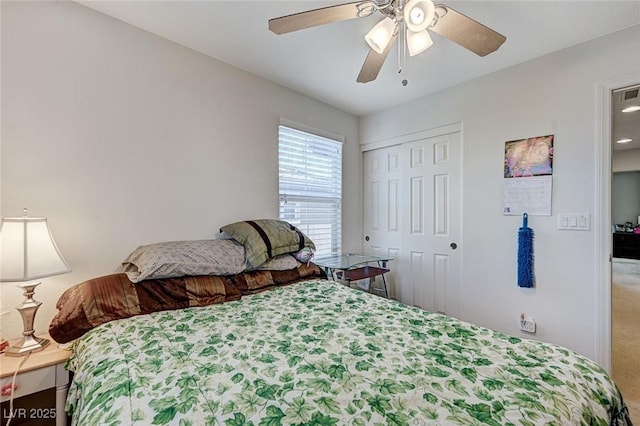8783 Halcon Ave, Las Vegas, NV 89148 - carpeted bedroom with a closet and a ceiling fan