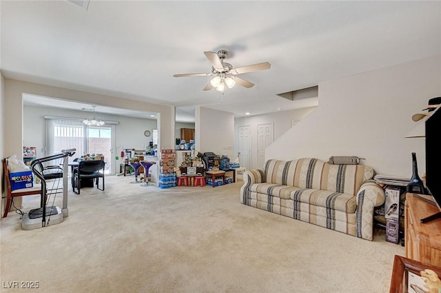 8783 Halcon Ave, Las Vegas, NV 89148 - living area with carpet flooring and ceiling fan with notable chandelier