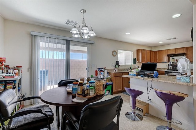 8783 Halcon Ave, Las Vegas, NV 89148 - dining space featuring visible vents, recessed lighting, a chandelier, and light colored carpet