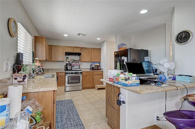 8783 Halcon Ave, Las Vegas, NV 89148 - kitchen featuring a sink, appliances with stainless steel finishes, under cabinet range hood, visible vents, and recessed lighting