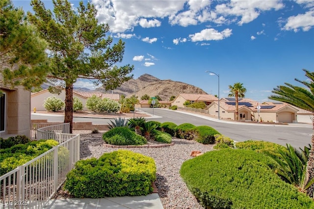 10709 Hunters Woods Pl, Las Vegas, NV 89134 - view of yard with fence and a mountain view
