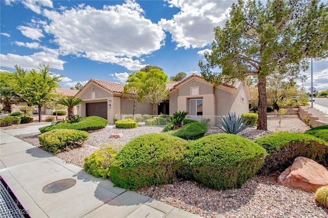 10709 Hunters Woods Pl, Las Vegas, NV 89134 - view of front facade with an attached garage, stucco siding, and a tiled roof
