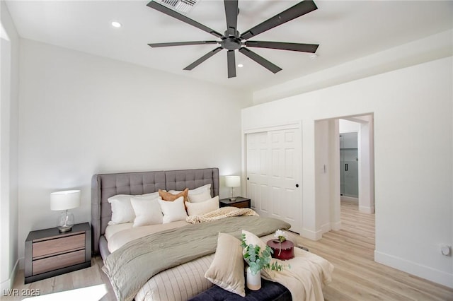 10709 Hunters Woods Pl, Las Vegas, NV 89134 - bedroom with light wood-type flooring, recessed lighting, a closet, baseboards, and ceiling fan