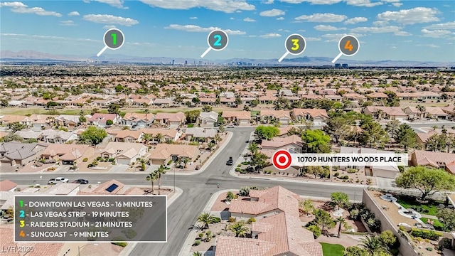 10709 Hunters Woods Pl, Las Vegas, NV 89134 - aerial view of residential area with a mountain backdrop