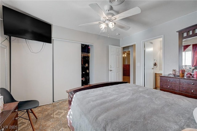 bedroom with a closet and a ceiling fan