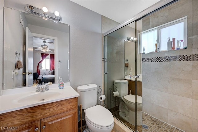 full bath featuring vanity, toilet, ensuite bath, and a stall shower