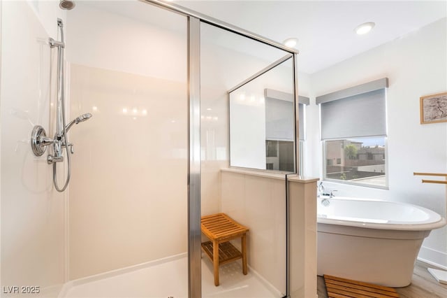 7307 Grace Estate Ave, Las Vegas, NV 89113 - bathroom featuring a soaking tub and a stall shower