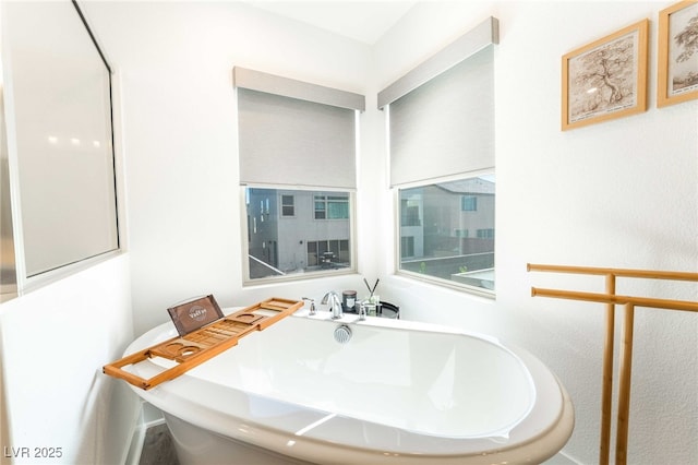 7307 Grace Estate Ave, Las Vegas, NV 89113 - full bath with a freestanding tub and a sink