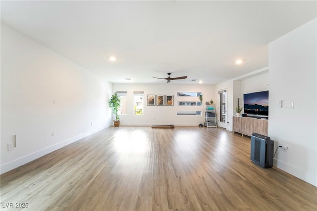 7307 Grace Estate Ave, Las Vegas, NV 89113 - unfurnished living room featuring recessed lighting, wood finished floors, a ceiling fan, and baseboards