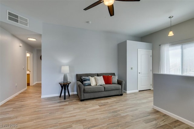 2305 W Horizon Ridge Pkwy Unit 3713, Henderson, NV 89052 - living area with light wood finished floors, visible vents, a ceiling fan, and baseboards