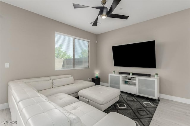 3208 Lumassina Way, Henderson, NV 89044 - living room featuring wood finished floors, baseboards, and ceiling fan