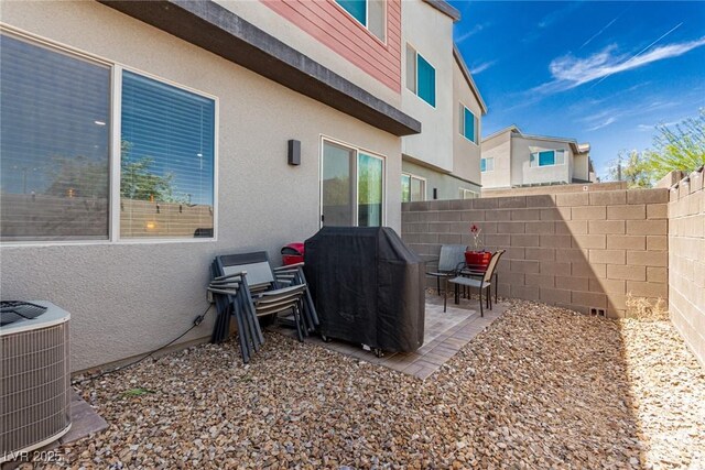 3208 Lumassina Way, Henderson, NV 89044 - view of patio / terrace with fence and cooling unit