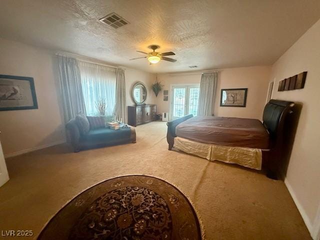 10561 Rancho Destino Rd, Las Vegas, NV 89183 - carpeted bedroom featuring visible vents, a textured ceiling, ceiling fan, and baseboards
