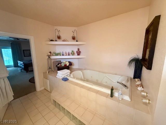10561 Rancho Destino Rd, Las Vegas, NV 89183 - bathroom featuring tile patterned floors and a whirlpool tub