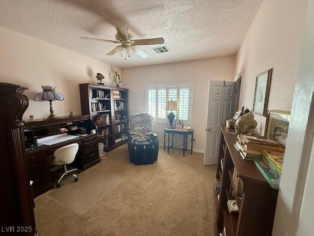10561 Rancho Destino Rd, Las Vegas, NV 89183 - office with carpet floors, ceiling fan, a textured ceiling, and visible vents