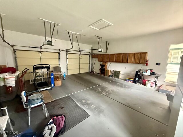 10561 Rancho Destino Rd, Las Vegas, NV 89183 - garage featuring a garage door opener