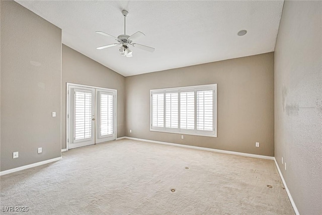 1742 Sand Storm Dr, Henderson, NV 89074 - spare room with french doors, baseboards, carpet, lofted ceiling, and a ceiling fan