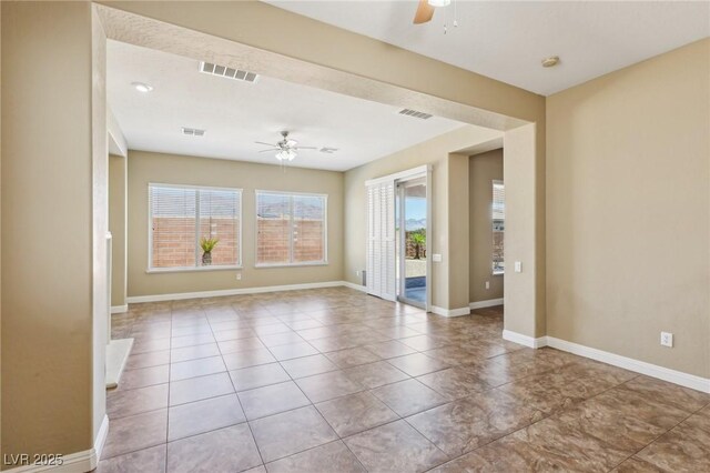 3904 Redbreast Ln, North Las Vegas, NV 89084 - empty room with visible vents, tile patterned flooring, and ceiling fan