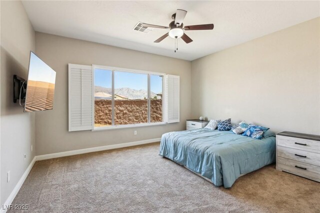 3904 Redbreast Ln, North Las Vegas, NV 89084 - bedroom featuring carpet floors, a ceiling fan, and baseboards