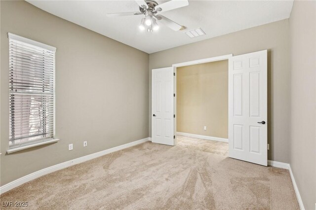 3904 Redbreast Ln, North Las Vegas, NV 89084 - unfurnished bedroom featuring visible vents, baseboards, carpet flooring, and ceiling fan