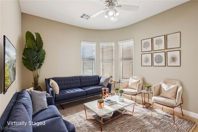 3904 Redbreast Ln, North Las Vegas, NV 89084 - living area with ceiling fan, a wealth of natural light, visible vents, and baseboards