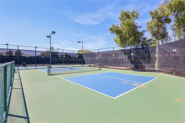 3904 Redbreast Ln, North Las Vegas, NV 89084 - view of sport court with community basketball court and fence