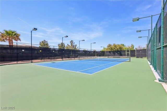 3904 Redbreast Ln, North Las Vegas, NV 89084 - view of tennis court featuring fence
